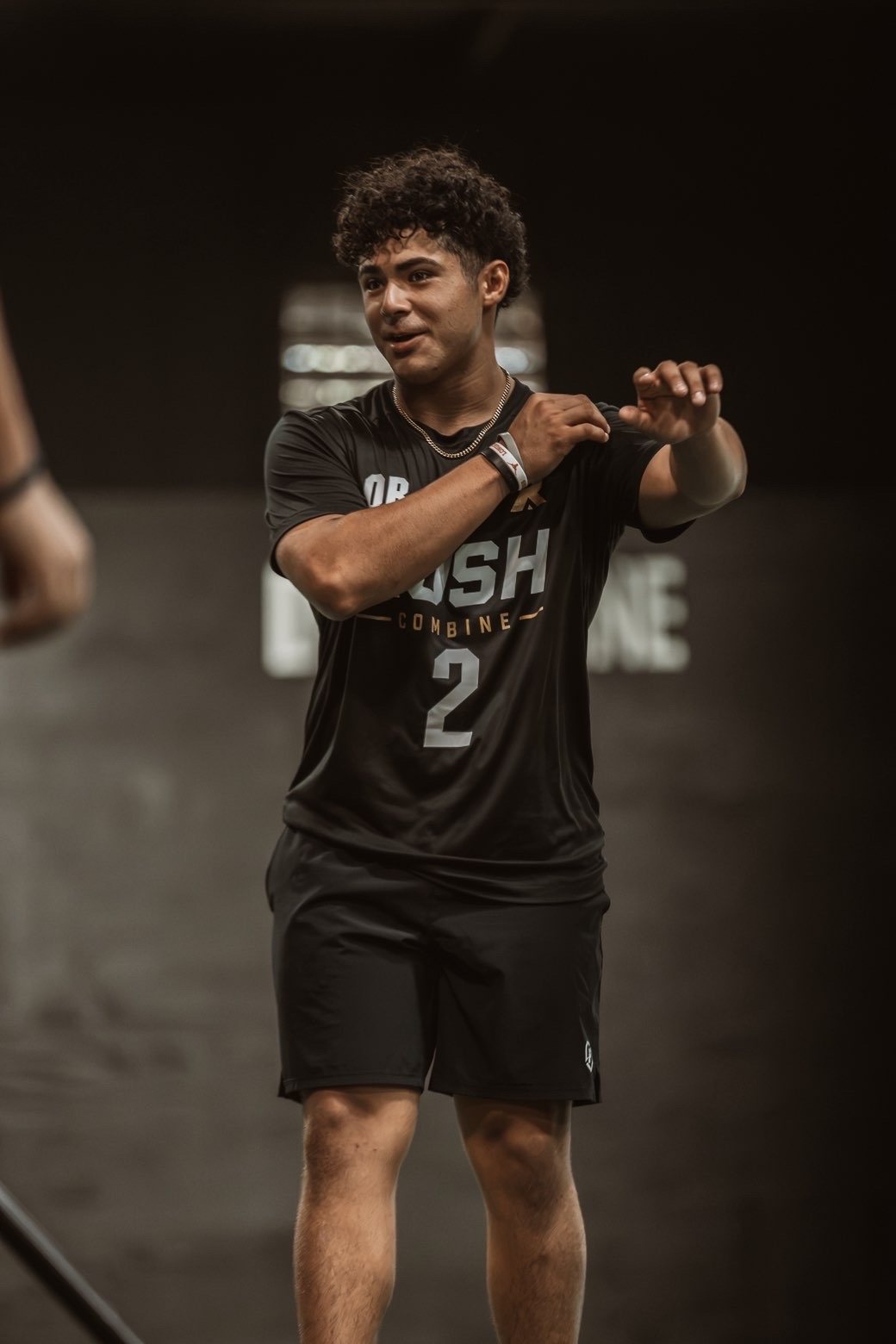 Athlete smiling in Rush Combine jersey